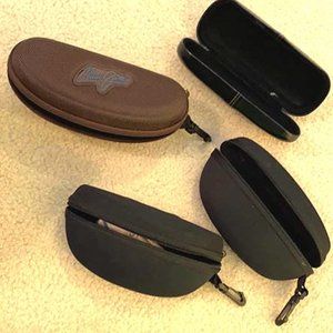 Four glass/sunglass cases
